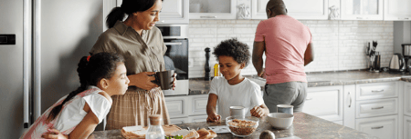 Family spending time together in new kitchen