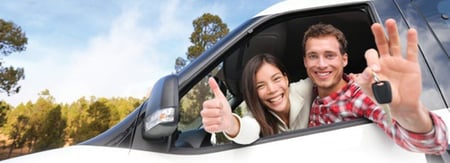 Couple in newly financed car 