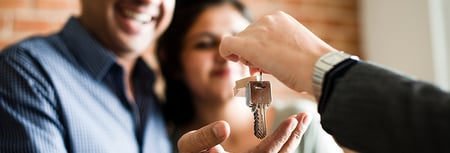 Homeowners getting keys to their new home