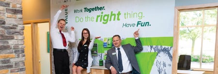 Employees celebrating winning best and brightest companies to work for