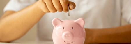 saving money in a piggy bank