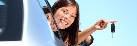 Women enjoying new car 