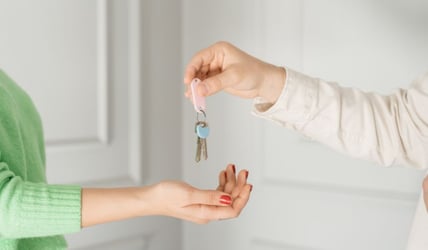 first time homeowner getting keys to new home