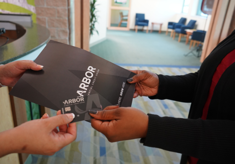 Commercial banking team helping new member 