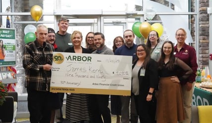 Staff celebrate winner at three rivers location 