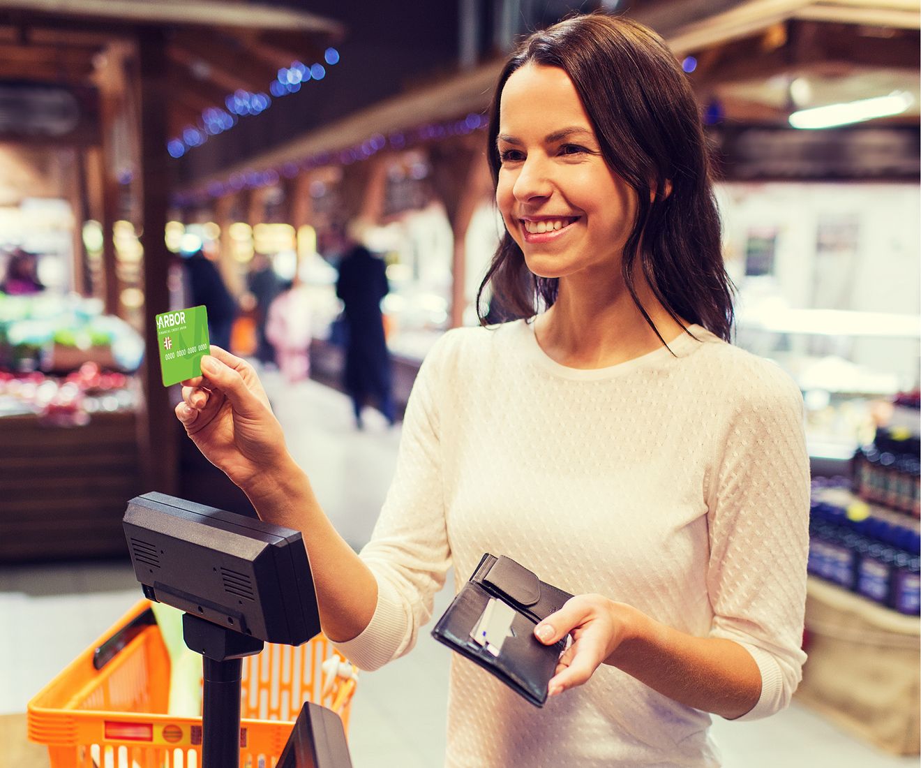 Women shopping with Arbor Financial debit card