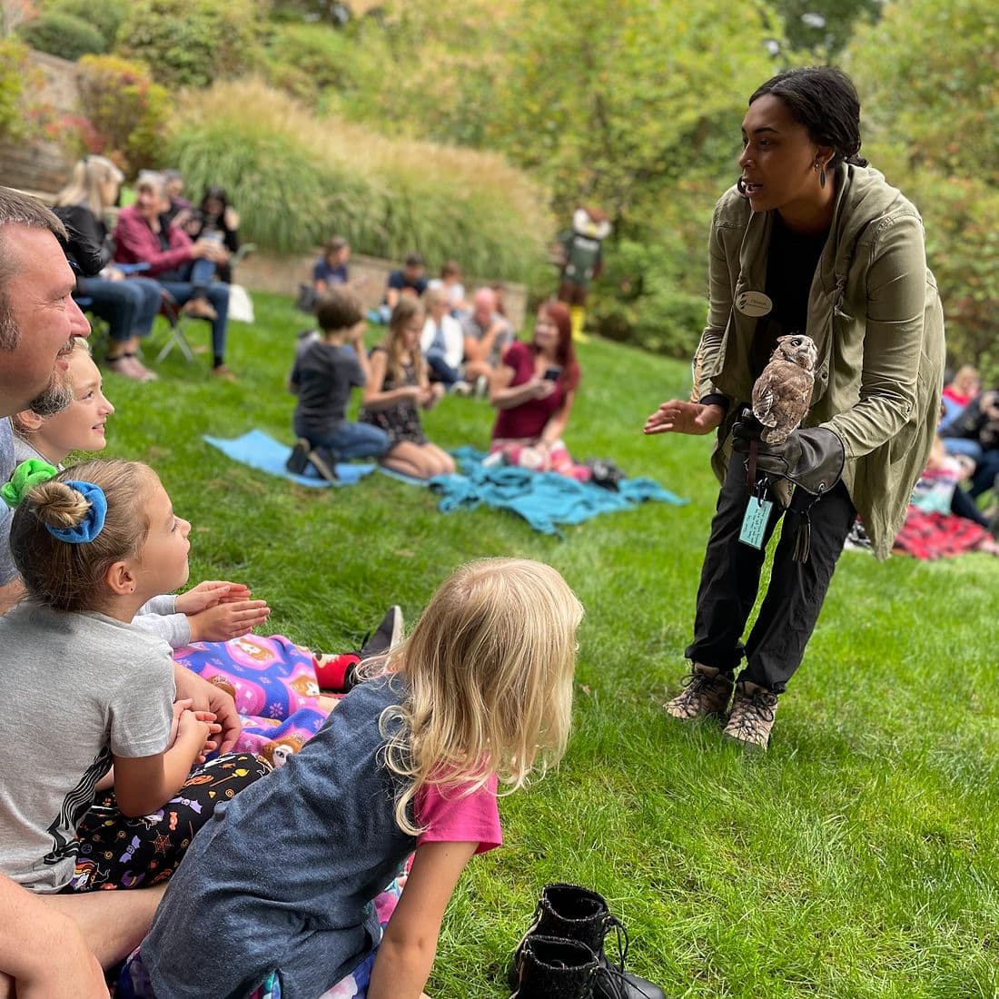 Children at a live owl encounter at The Kalamazoo Nature Center.