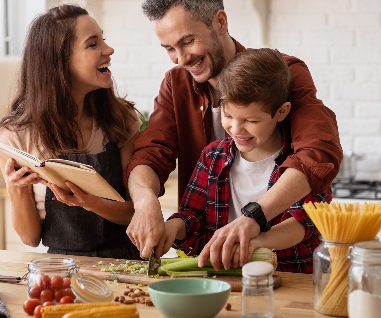 Family cooking dinner together.