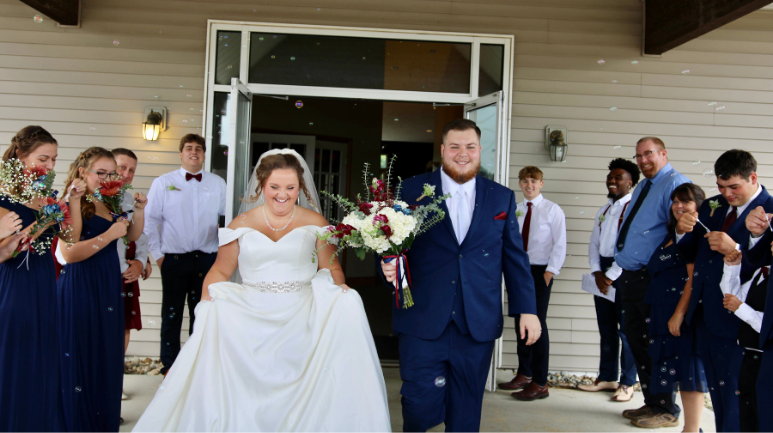 Brandon and wife on wedding day