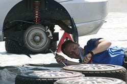 Mechanic fixing a car