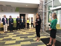 Local Chamber of Commerce attends the office's grand opening.