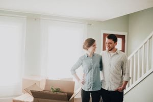 Couple evaluating room