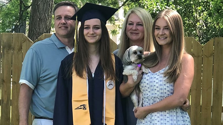 Holly and family at graduation 